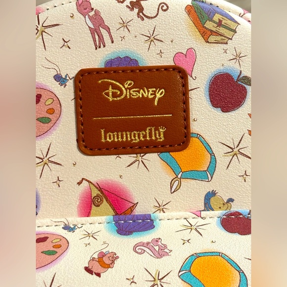 Loungefly Disney Princess Icons & Sidekicks Mini
Backpack NWT - Picture 14 of 16